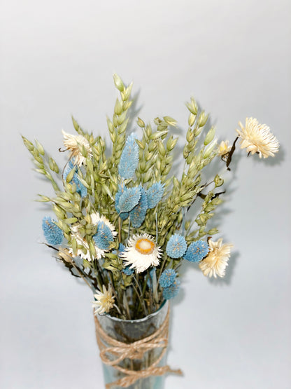 Bouquet of dried blue, green and white flowers