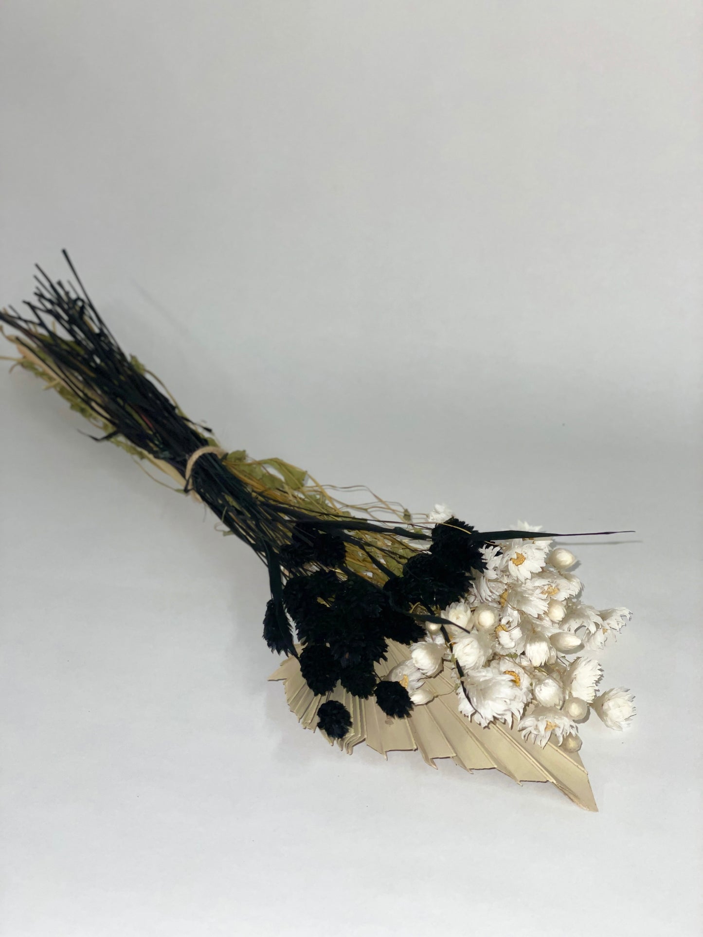 Bouquet of black and white dried flowers