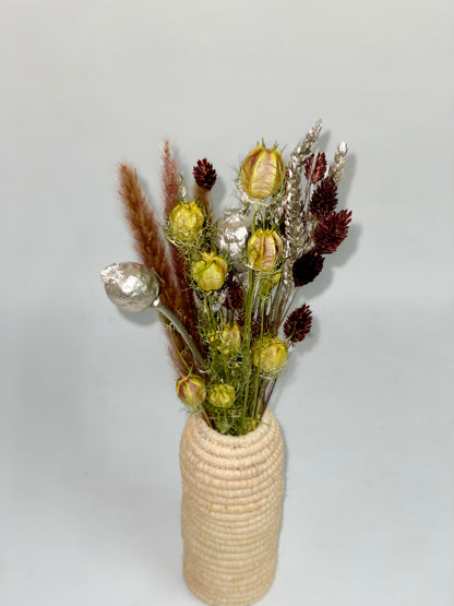 Bouquet of natural green, silver and brown dried flowers