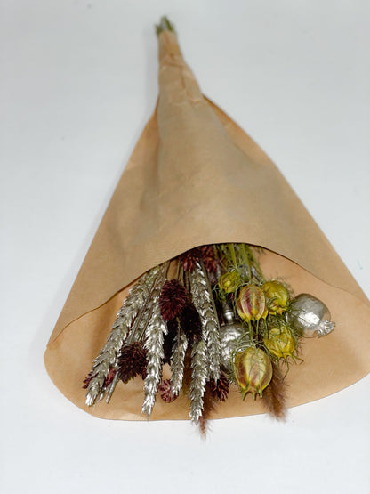 Bouquet of natural green, silver and brown dried flowers