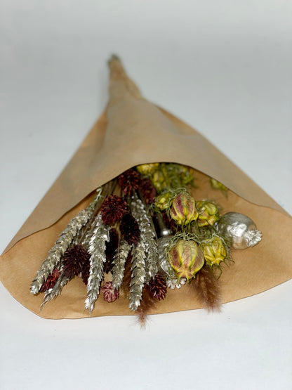 Bouquet of natural green, silver and brown dried flowers
