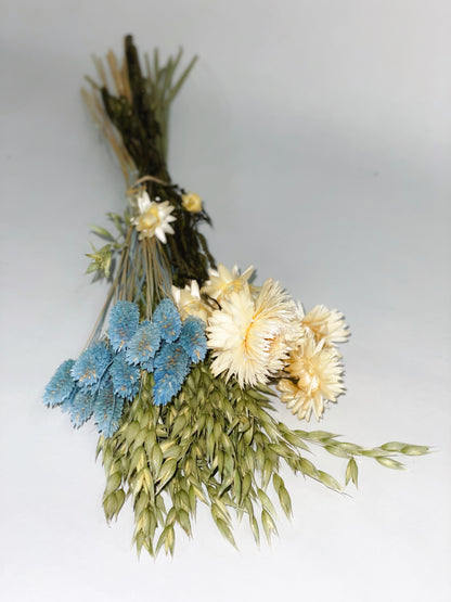 Bouquet of dried blue, green and white flowers