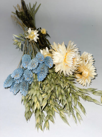 Bouquet of dried blue, green and white flowers