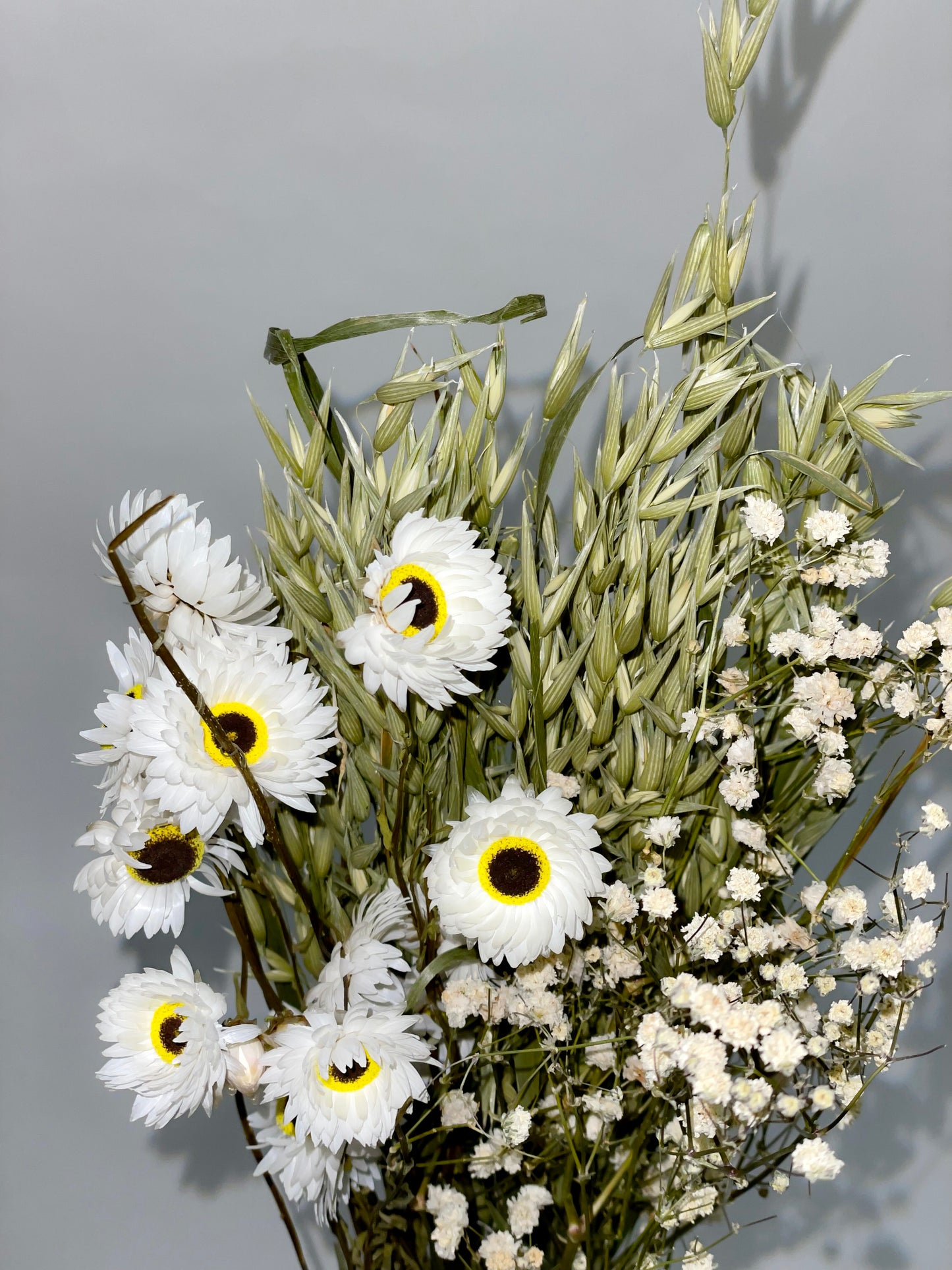 Bouquet of dried green and white flowers