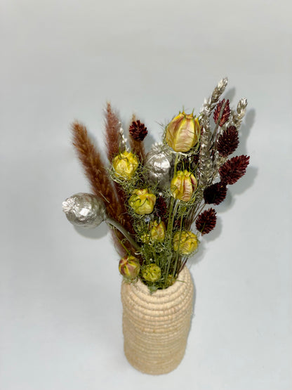 Bouquet of natural green, silver and brown dried flowers