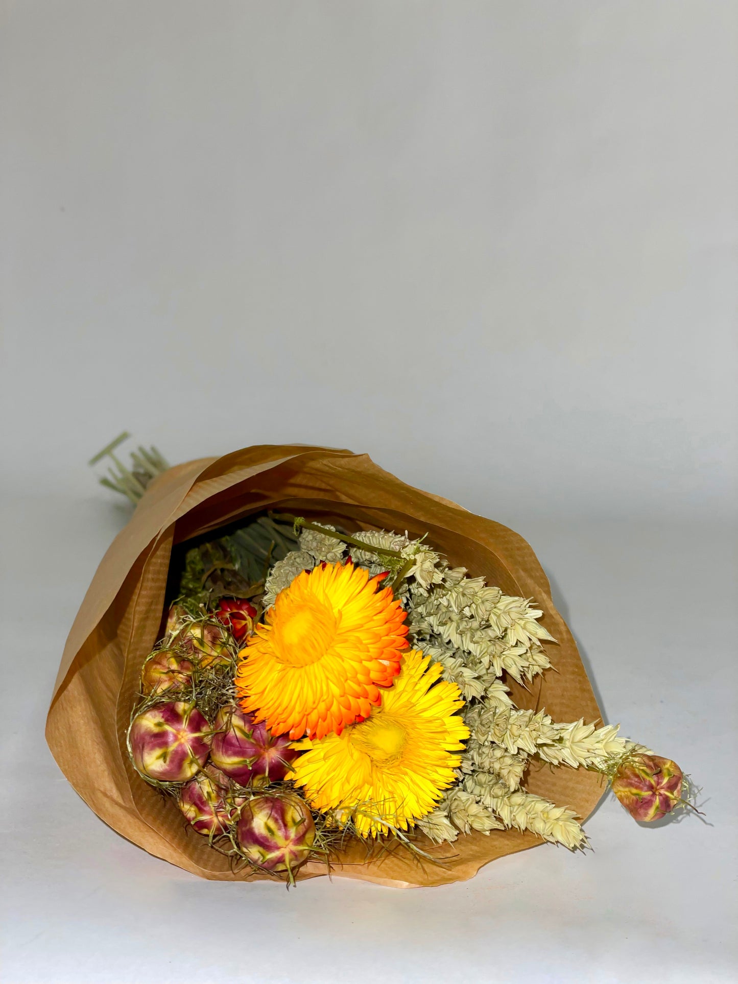 Bouquet of purple flame green dried flowers