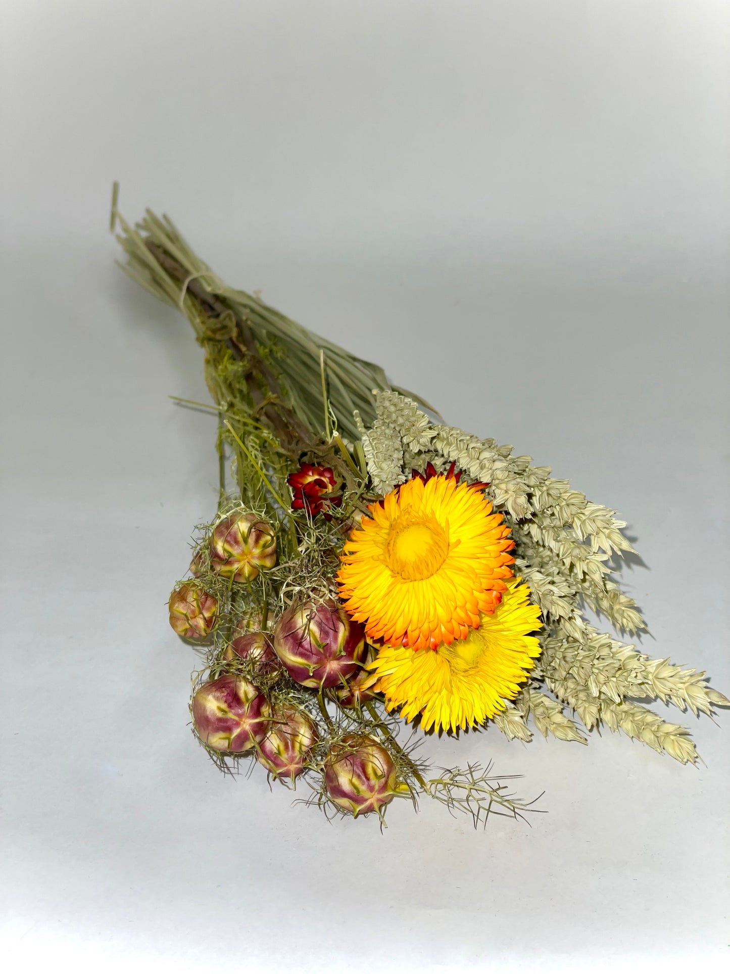 Bouquet of purple flame green dried flowers